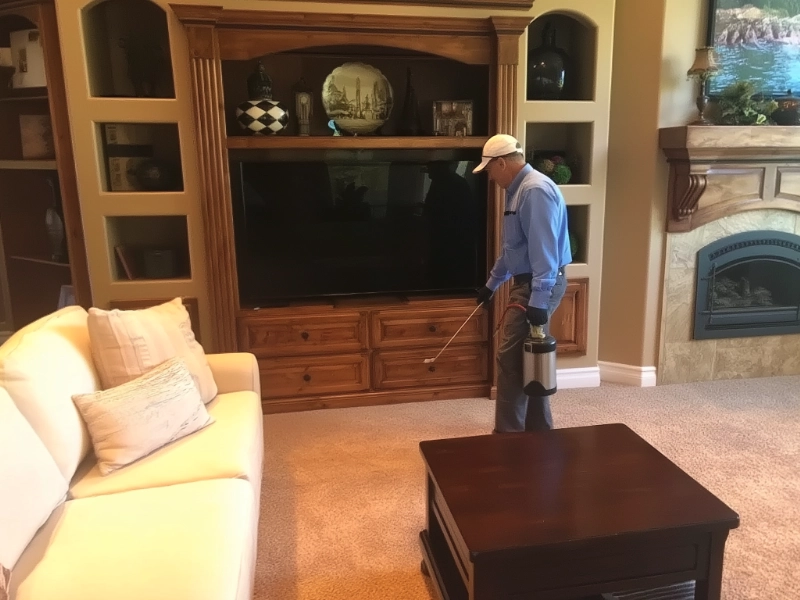 Affordable Pest Control technician performing professional cockroach treatment